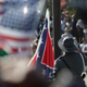 A South Carolina state police honor guard lowers the Confederate flag from the Statehouse grounds July 10, 2015, in Columbia. Republican Gov. Nikki Haley presided over the event after signing the historic legislation to remove the flag the day before.
John Moore/Getty Images